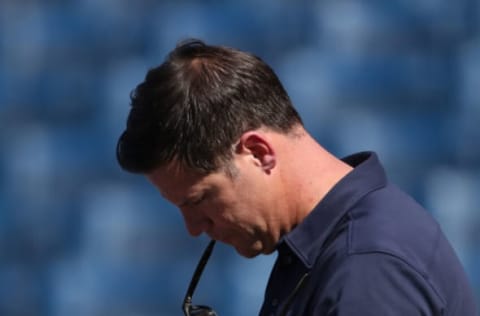 TORONTO, ON – JULY 6: General manager Ross Atkins of the Toronto Blue Jays checks his phone during batting practice before the start of MLB game action against the Houston Astros at Rogers Centre on July 6, 2017 in Toronto, Canada. (Photo by Tom Szczerbowski/Getty Images)