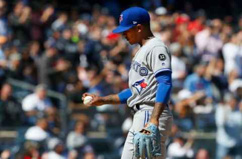 NEW YORK, NY – APRIL 21: Marcus Stroman #6 of the Toronto Blue Jays looks at the ball as he stands on the mound during the sixth inning against the New York Yankees at Yankee Stadium on April 21, 2018 in the Bronx borough of New York City. (Photo by Jim McIsaac/Getty Images)