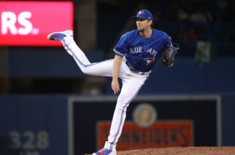 TORONTO, ON – MAY 19: Deck McGuire #48 of the Toronto Blue Jays delivers a pitch in the ninth inning during MLB game action against the Oakland Athletics at Rogers Centre on May 19, 2018 in Toronto, Canada. (Photo by Tom Szczerbowski/Getty Images)