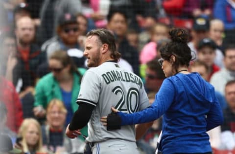 BOSTON, MA – MAY 28: Josh Donaldson #20 of the Toronto Blue Jays leaves the game and is replace by pinch runner Giovanny Urshela #3 of the Toronto Blue Jays in the top of the fifth inning of the game against the Boston Red Sox at Fenway Park on May 28, 2018 in Boston, Massachusetts. MLB Players across the league are wearing special uniforms to commemorate Memorial Day. (Photo by Omar Rawlings/Getty Images)