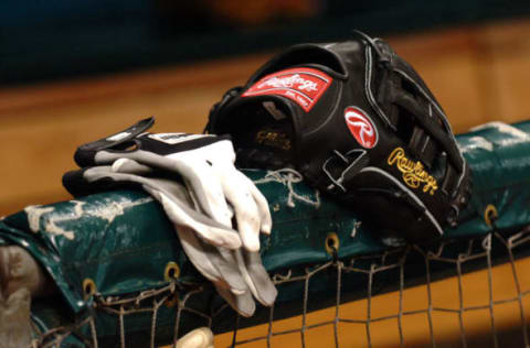 Toronto Blue Jays gloves are set for play near the dugout before play against the Tampa Bay Devil Rays April 5, 2005 at Tropicana Field. (Photo by A. Messerschmidt/Getty Images) *** Local Caption ***