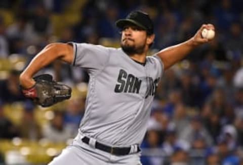 LOS ANGELES, CA – MAY 26: hand of Brad Hand #52 of the San Diego Padres earns a save in the ninth inning of the game against the Los Angeles Dodgers at Dodger Stadium on May 26, 2018 in Los Angeles, California. (Photo by Jayne Kamin-Oncea/Getty Images)