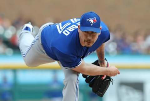 DETROIT, MI – JUNE 2: John Axford #77 of the Toronto Blue Jays pitches during the sixth inning of the game against the Detroit Tigers at Comerica Park on June 2, 2018 in Detroit, Michigan. (Photo by Leon Halip/Getty Images)