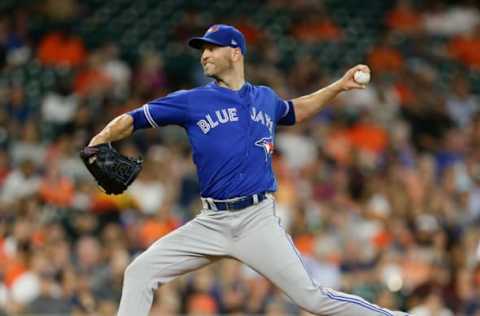 HOUSTON, TX – JUNE 25: J.A. Happ #33 of the Toronto Blue Jays pitches in the first inning against the Houston Astros at Minute Maid Park on June 25, 2018 in Houston, Texas. (Photo by Bob Levey/Getty Images)