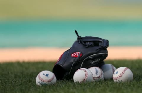 PHILADELPHIA, PA – JUNE 29: A glove and balls sit on the infield before a game between the Washington Nationals and Philadelphia Phillies at Citizens Bank Park on June 29, 2018 in Philadelphia, Pennsylvania. (Photo by Rich Schultz/Getty Images)