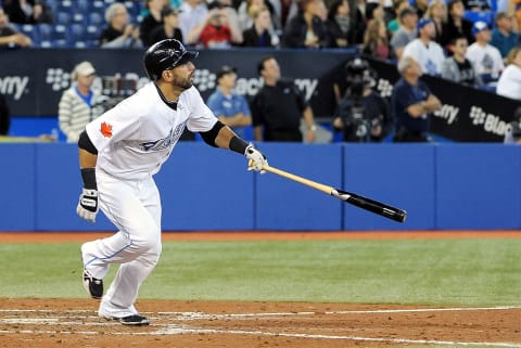 TORONTO, ON – SEPTEMBER 22: Jose Bautista #19 of the Toronto Blue Jays watches the ball as he runs to 1st base after a hit against the Seattle Mariners on September 22, 2010 at the Rogers Centre in Toronto, Canada. (Photo by Matthew Manor/Getty Images)