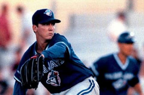 Toronto Blue Jays pitcher David Cone winds up to pitch in the first inning in an exhibition game against the Philadelphia Phillies 13 April in Clearwater, Florida. Philadelphia won, 5-4. AFP PHOTO (Photo by PETER MUHLY / AFP) (Photo by PETER MUHLY/AFP via Getty Images)