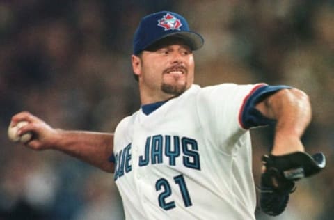 Last years Cy Young award winning pitcher, Roger Clemens throws the first pitch of the Toronto Blue Jays season against the Minnesota Twins at Toronto’s Skydome 01 April. Clemens won 3-2 and pitched 7 innings with 2 hits, 1 run and 3 strike outs. Carlo ALLEGRI AFP PHOTO (Photo by CARLO ALLEGRI / AFP) (Photo by CARLO ALLEGRI/AFP via Getty Images)