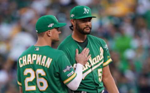 OAKLAND, CALIFORNIA – OCTOBER 02: Matt Chapman #26 of the Oakland Athletics consoles Sean Manaea #55 after being pulled from the game in the third inning of the American League Wild Card Game against the Tampa Bay Rays at RingCentral Coliseum on October 02, 2019 in Oakland, California. (Photo by Thearon W. Henderson/Getty Images)