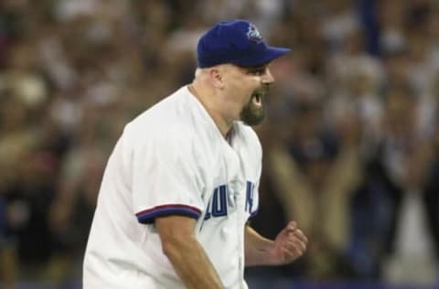 Toronto Blue Jays pitcher David Wells pumps his fist after winning his 20th game of the season, beating the New York Yankees 3-1 in Toronto, 21 September, 2000. Wells becomes the second oldest pitcher to win 20 games for the first time in his career at the age of 37. AFP PHOTO/Aaron HARRIS (Photo by AARON HARRIS / AFP) (Photo by AARON HARRIS/AFP via Getty Images)