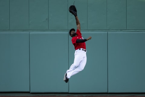 BOSTON, MA – SEPTEMBER 4: Jackie Bradley Jr. #19 of the Boston Red Sox makes a leaping catch during the sixth inning of a game against the Toronto Blue Jays on September 4, 2020 at Fenway Park in Boston, Massachusetts. The 2020 season had been postponed since March due to the COVID-19 pandemic. (Photo by Billie Weiss/Boston Red Sox/Getty Images)