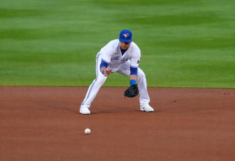 BUFFALO, NY – SEPTEMBER 22: Joe Panik #2 of the Toronto Blue Jays fields the ball during the first inning against the New York Yankees at Sahlen Field on September 22, 2020 in Buffalo, New York. The Blue Jays are the home team due to the Canadian government’s policy on COVID-19, which prevents them from playing in their home stadium in Canada. (Photo by Timothy T Ludwig/Getty Images)