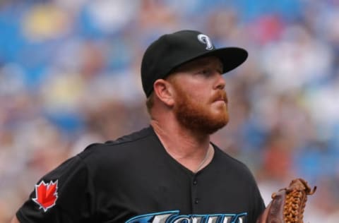 TORONTO, CANADA – AUGUST 27: Jesse Litsch #51 of the Toronto Blue Jays jogs off the mound after being relieved during MLB game action against the Tampa Bay Rays on August 27, 2011 at Rogers Centre in Toronto, Ontario, Canada. (Photo by Tom Szczerbowski/Getty Images)