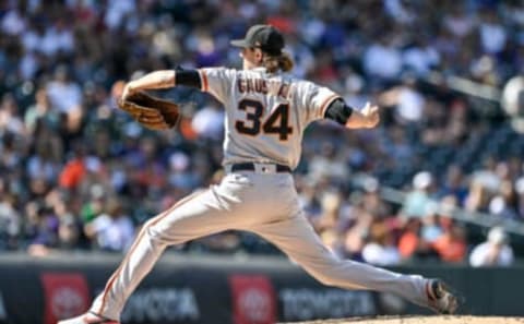 DENVER, CO – SEPTEMBER 26: Kevin Gausman #34 of the San Francisco Giants pitches against the Colorado Rockies in the third inning of a game at Coors Field on September 26, 2021 in Denver, Colorado. (Photo by Dustin Bradford/Getty Images)