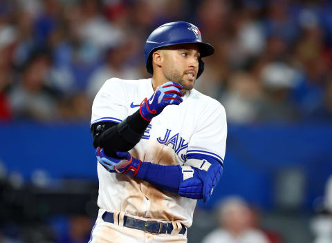 TORONTO, ON – JULY 28: George Springer #4 of the Toronto Blue Jays injures his elbow while flying out in the eighth inning against the Detroit Tigers at Rogers Centre on July 28, 2022, in Toronto, Ontario, Canada. (Photo by Vaughn Ridley/Getty Images)