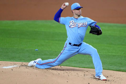 ARLINGTON, TEXAS – JULY 26: Corey Kluber (28) of the Texas Rangers pitches against the Colorado Rockies in the top of the first inning at Globe Life Field on July 26, 2020 in Arlington, Texas. (Photo by Tom Pennington/Getty Images)