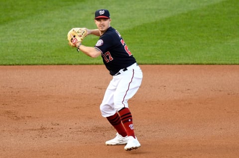 WASHINGTON, DC – SEPTEMBER 22: Brock Holt #27 of the Washington Nationals throws the ball to first base against the Philadelphia Phillies during the second game of a doubleheader at Nationals Park on September 22, 2020 in Washington, DC. (Photo by G Fiume/Getty Images)