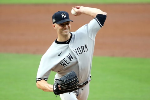 SAN DIEGO, CALIFORNIA – OCTOBER 06: J.A. Happ #33 of the New York Yankees delivers the pitch against the Tampa Bay Rays during the second inning in Game Two of the American League Division Series at PETCO Park on October 06, 2020 in San Diego, California. (Photo by Sean M. Haffey/Getty Images)