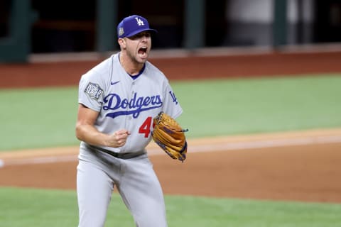 ARLINGTON, TEXAS – OCTOBER 25: Blake Treinen #49 of the Los Angeles Dodgers celebrates after striking out Willy Adames of the Tampa Bay Rays to secure the 4-2 victory in Game Five of the 2020 MLB World Series at Globe Life Field on October 25, 2020 in Arlington, Texas. (Photo by Tom Pennington/Getty Images)