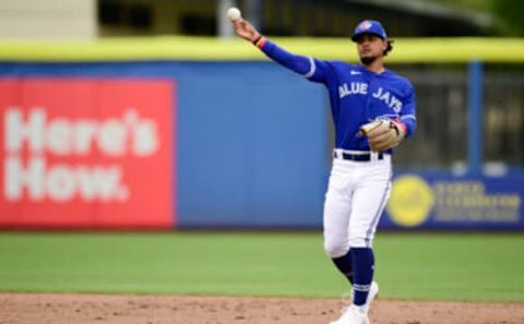 DUNEDIN, FLORIDA – MARCH 21: Santiago Espinal #5 of the Toronto Blue Jays warms up during the ninth inning against the New York Yankees during a spring training game at TD Ballpark on March 21, 2021 in Dunedin, Florida. (Photo by Douglas P. DeFelice/Getty Images)