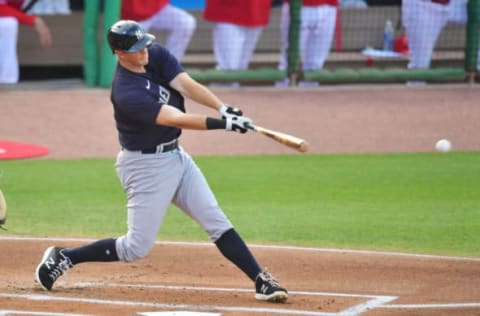 CLEARWATER, FLORIDA – MARCH 25: DJ LeMahieu #26 of the New York Yankees hits a single off of Matt Moore of the Philadelphia Phillies in the first inning of a spring training game on March 25, 2021 at BayCare Ballpark in Clearwater, Florida. (Photo by Julio Aguilar/Getty Images)