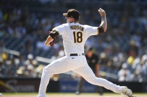 SAN DIEGO, CA – AUGUST 11: Daniel Hudson #18 of the San Diego Padres pitches during the eighth inning of a baseball game against the Miami Marlins at Petco Park on August 11, 2021 in San Diego, California. (Photo by Denis Poroy/Getty Images)