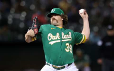 OAKLAND, CALIFORNIA – SEPTEMBER 08: Andrew Chafin #39 of the Oakland Athletics pitches against the Chicago White Sox in the eighth inning at RingCentral Coliseum on September 08, 2021 in Oakland, California. (Photo by Ezra Shaw/Getty Images)