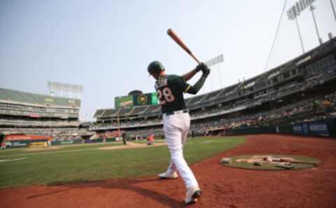 OAKLAND, CA – SEPTMEBER 25: Matt Olson #28 of the Oakland Athletics in the on-deck circle during the game against the Houston Astros at RingCentral Coliseum on September 25, 2021 in Oakland, California. The Athletics defeated the Astros 2-1. (Photo by Michael Zagaris/Oakland Athletics/Getty Images)