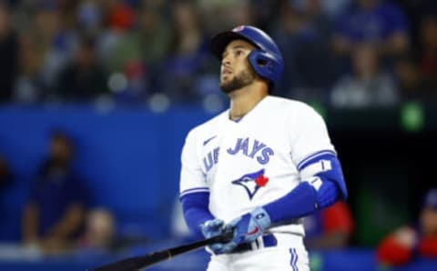 TORONTO, ON – APRIL 10: George Springer #4 of the Toronto Blue Jays hits a home run in the first inning during a MLB game against the Texas Rangers at Rogers Centre on April 10, 2022 in Toronto, Ontario, Canada. (Photo by Vaughn Ridley/Getty Images)