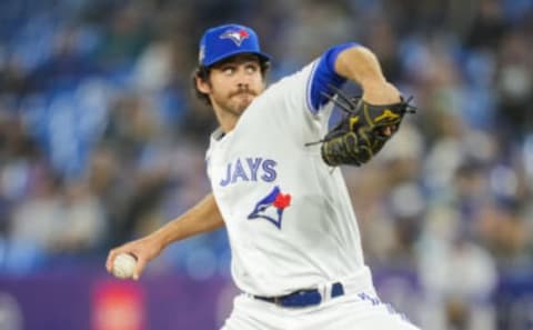 TORONTO, ON – APRIL 15: Jordan Romano #68 of the Toronto Blue Jays pitches to the Oakland Athletics in the ninth inning during their MLB game at the Rogers Centre on April 15, 2022 in Toronto, Ontario, Canada. All players are wearing the number 42 in honor of Jackie Robinson Day. (Photo by Mark Blinch/Getty Images)