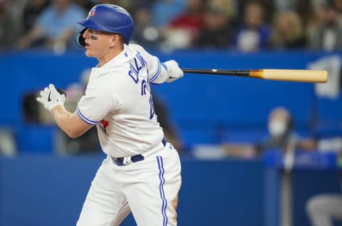 TORONTO, ON – APRIL 16: Zach Collins #21 of the Toronto Blue Jays hits a single against the Oakland Athletics in the fourth inning during their MLB game at the Rogers Centre on April 16, 2022, in Toronto, Ontario, Canada. (Photo by Mark Blinch/Getty Images)