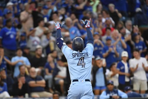 SEATTLE, WASHINGTON – JULY 09: George Springer #4 of the Toronto Blue Jays gestures after hitting a solo home run to center field during the sixth inning against the Seattle Mariners at T-Mobile Park on July 09, 2022, in Seattle, Washington. (Photo by Alika Jenner/Getty Images)