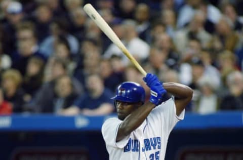 TORONTO – MARCH 31: First baseman Carlos Delgado #25 of the Toronto Blue Jays waits for a New York Yankees pitch during the MLB game at SkyDome on March 31, 2003 in Toronto, Canada. The Yankees defeated the Blue Jays 8-4. (Photo by Rick Stewart/Getty Images)