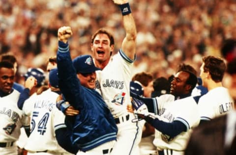 TORONTO, ON – OCTOBER 23: Paul Molitor of the Toronto Blue Jays, World Series MVP, celebrates the Blue Jays victory during World Series game six between the Philadelphia Phillies and Toronto Blue Jays on October 23, 1993 at the Skydome in Toronto, Ontario, Canada. The Blue Jays defeated the Phillies 8-6. (Photo by Rich Pilling/Getty Images)