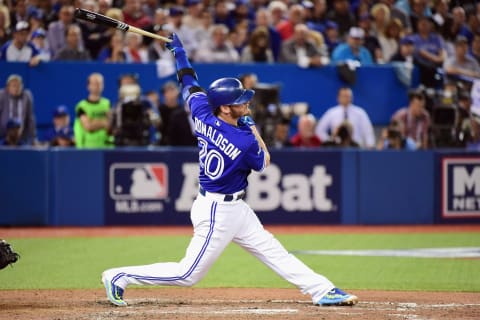 TORONTO, ON – OCTOBER 21: Josh Donaldson #20 of the Toronto Blue Jays hits a double against the seventh inning against the Kansas City Royals during game five of the American League Championship Series at Rogers Centre on October 21, 2015 in Toronto, Canada. (Photo by Harry How/Getty Images)