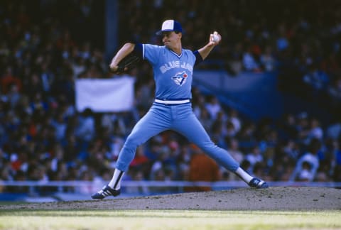 DETROIT, MI – CIRCA 1989: Jimmy Key #22 of the Toronto Blue Jays pitches against the Detroit Tigers during a Major League Baseball game circa 1989 at Tiger Stadium in Detroit, Michigan. Key played for the Blue Jays from 1984-92. (Photo by Focus on Sport/Getty Images)