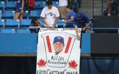 TORONTO, CANADA – JULY 6: Fans display a sign of Michael Saunders #21 of the Toronto Blue Jays in an effort to encourage voting for a roster spot on the All-Star team during MLB game action against the Kansas City Royals on July 6, 2016 at Rogers Centre in Toronto, Ontario, Canada. (Photo by Tom Szczerbowski/Getty Images)