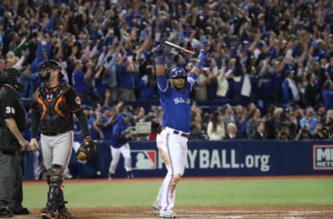 TORONTO, ON – OCTOBER 04: Edwin Encarnacion #10 of the Toronto Blue Jays reacts after hitting a three-run walk-off home run in the eleventh inning to defeat the Baltimore Orioles 5-2 in the American League Wild Card game at Rogers Centre on October 4, 2016 in Toronto, Canada. (Photo by Tom Szczerbowski/Getty Images)