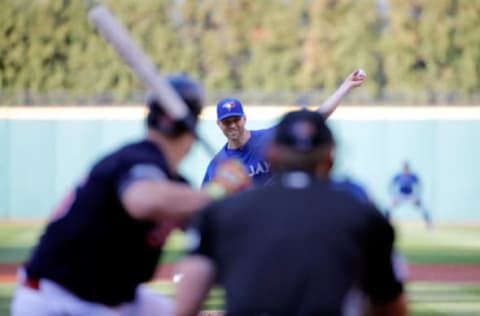 CLEVELAND, OH – OCTOBER 14: J.A. Happ #33 of the Toronto Blue Jays throws a pitch in the first inning against the Cleveland Indians during game two of the American League Championship Series at Progressive Field on October 15, 2016 in Cleveland, Ohio. (Photo by Gene Puskar – Pool/Getty Images)