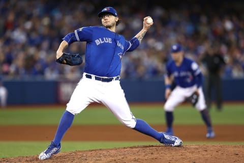 TORONTO, ON – OCTOBER 19: Brett Cecil #27 of the Toronto Blue Jays throws a pitch in the seventh inning against the Cleveland Indians during game five of the American League Championship Series at Rogers Centre on October 19, 2016, in Toronto, Canada. (Photo by Elsa/Getty Images)