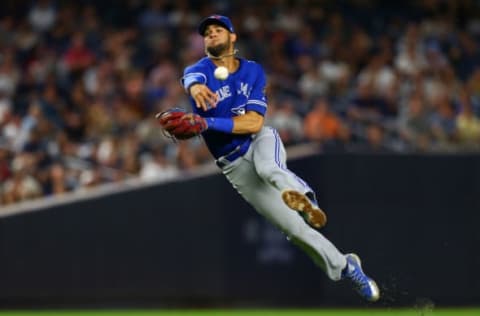 NEW YORK, NY – SEPTEMBER 14: Lourdes Gurriel Jr. #13 of the Toronto Blue Jays is unable to throw out Miguel Andujar #41 of the New York Yankees for an infield single in the fifth inning at Yankee Stadium on September 14, 2018 in the Bronx borough of New York City. (Photo by Mike Stobe/Getty Images)