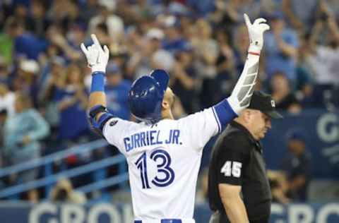 TORONTO, ON – SEPTEMBER 21: Lourdes Gurriel Jr. #13 of the Toronto Blue Jays celebrates after hitting a solo home run in the first inning during MLB game action against the Tampa Bay Rays at Rogers Centre on September 21, 2018 in Toronto, Canada. (Photo by Tom Szczerbowski/Getty Images)