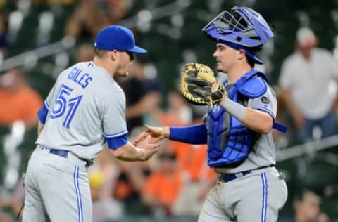 BALTIMORE, MD – SEPTEMBER 18: Ken Giles #51 of the Toronto Blue Jays celebrates with Reese McGuire #70 after a 6-4 victory against the Baltimore Orioles at Oriole Park at Camden Yards on September 18, 2018 in Baltimore, Maryland. (Photo by Greg Fiume/Getty Images)