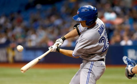 ST. PETERSBURG, FL – AUGUST 22: Norichika Aoki #23 of the Toronto Blue Jays hits a sacrifice fly to left field to score Ezequiel Carrera during the fifth inning of a game against the Tampa Bay Rays on August 22, 2017 at Tropicana Field in St. Petersburg, Florida. (Photo by Brian Blanco/Getty Images)