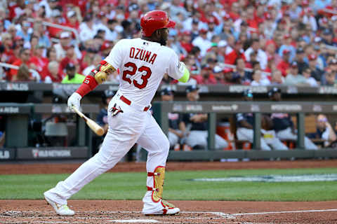 ST LOUIS, MISSOURI – OCTOBER 07: Marcell Ozuna #23 of the St. Louis Cardinals hits his second solo home run of the game, against the Atlanta Braves during the fourth inning in game four of the National League Division Series at Busch Stadium on October 07, 2019 in St Louis, Missouri. (Photo by Scott Kane/Getty Images)