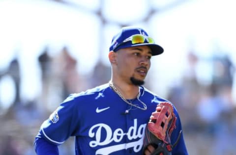 GLENDALE, ARIZONA – FEBRUARY 26: Mookie Betts #50 of the Los Angeles Dodgers runs to the dugout from right field after the end of an inning during a spring training game against the Los Angeles Angels at Camelback Ranch on February 26, 2020 in Glendale, Arizona. (Photo by Norm Hall/Getty Images)