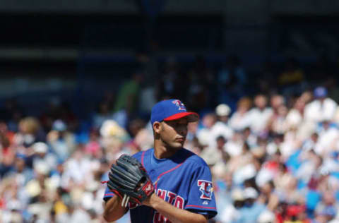 TORONTO – JUNE 15: Pitcher Aquilino Lopez #44 of the Toronto Blue Jays delivers against the Chicago Cubs during the MLB game at Skydome on June 15, 2003 in Toronto, Ontario. The Blue Jays defeated the Cubs 5-4. (Photo By Dave Sandford/Getty Images)