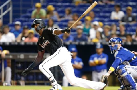 MIAMI, FL – SEPTEMBER 01: Lewis Brinson #9 of the Miami Marlins singles in the first inning against the Toronto Blue Jays at Marlins Park on September 1, 2018 in Miami, Florida. (Photo by Michael Reaves/Getty Images)