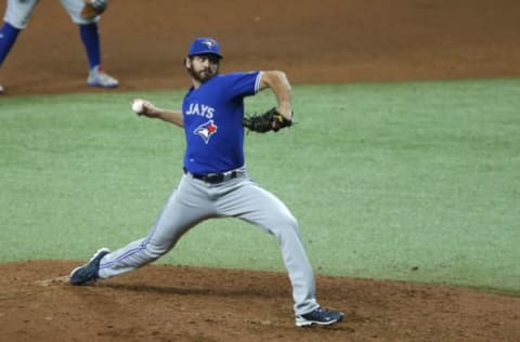 Aug 24, 2020; St. Petersburg, Florida, USA; Toronto Blue Jays pitcher Jordan Romano (68) throws a pitch during the ninth inning against the Tampa Bay Rays at Tropicana Field. Mandatory Credit: Reinhold Matay-USA TODAY Sports