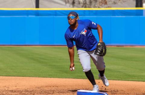 Feb 23, 2021; Dunedin, FL, USA; Toronto Blue Jays infielder Vlad Guerrero, Jr. takes infield practice during spring training. Mandatory Credit: Toronto Blue Jays/Handout Photo via USA TODAY Sports